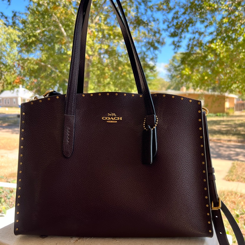 Coach Charlie Carryall. Border Rivets Handbag. Excellent used condition.